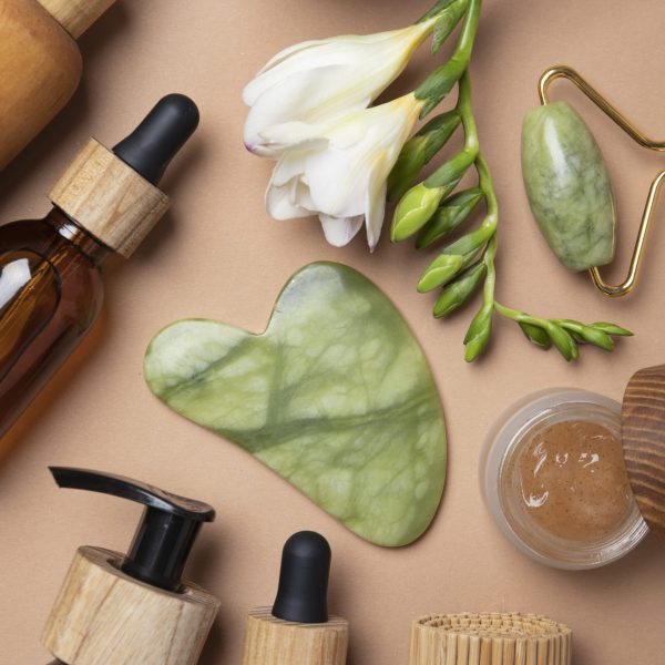 flat-lay-gua-sha-care-products-arrangement